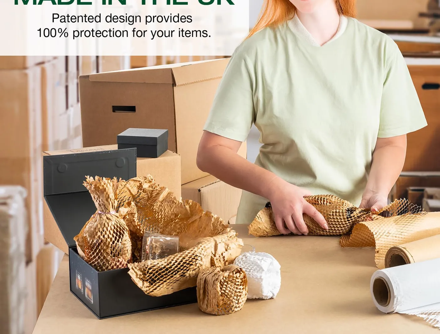 Packing a box with Bergvich honeycomb paper, sustainably made in the UK